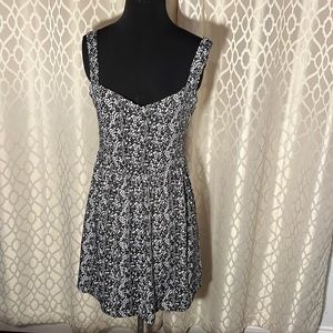 Black top with white and gray flowers from BeBop Size M